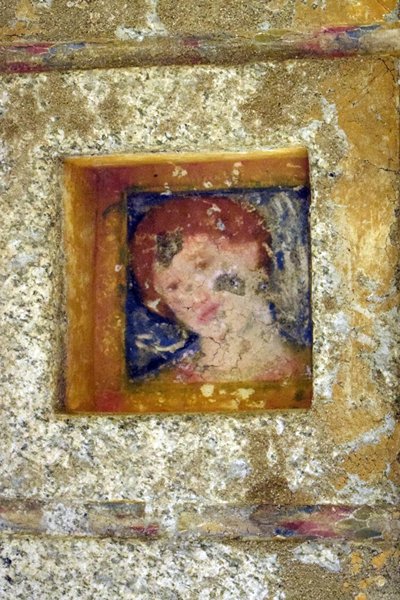 Een klein vrouwenportretje in de Ostrousha tombe